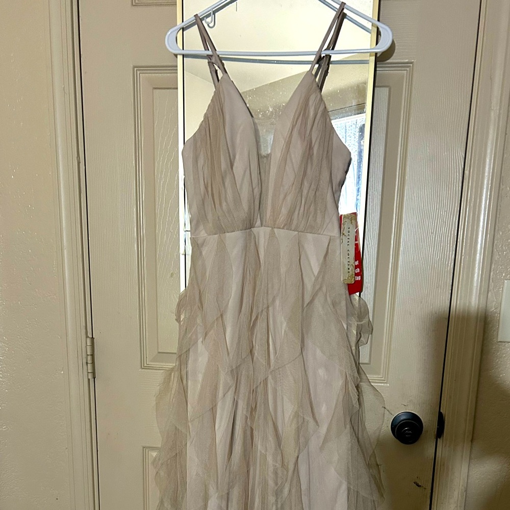 Social couture beige sleeveless Halter Prom Gown